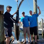From Captain John Raguso (ROFFS™ client): "Had one of the best "away" shark charters ever aboard Capt. Joe LaFace's Hampton Bays charter boat Jo-Deene at the 21st Annual Wally & Doug Oakland's Memorial Shark Tournament on June 27th out of Shinnecock Inlet. Joining us was his son Capt. Jo-Jo, one of NYPD's finest.
We headed out to some clean 65-degree water SW of Montauk that seemed like the place to go, courtesy of sea surface sat charts from ROFFS™. Had a 125-mako as soon as we dropped in and released it after a short fight, looking for bigger game. A thresher came calling about 10-minutes later and gobbled up a fresh bunker bait on a mighty-mite Penn 16VSX outfit spooled with 600-yards of hi-vis yellow 65-lb TUF-Line superbraid.
The fight was on and after about 1.5-hours of pulling 22-lbs of strike drag, the sweet little 16 put another big shark notch in her reel seat with Jo-Jo slugging it out and besting the big whiptail. We were able to drag her tail first into the Grady Canyon 271's cockpit via the wave gate and headed home early, getting back to Oakland's at 11am.
This 341-lb Thresher was the tournament's biggest fish and took home first prize and a bunch of the calcutta. Capt. Joe and Capt. Jo-Jo are great folks and their Grady is totally tricked out for their inshore charters specialty...and obviously offshore charters now too! Thanks for the invitation guys, it was a pleasure to introduce you both to the joys of the lite-tackle, big game, sport fishing experience."